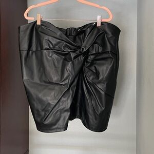 Faux leather black mini skirt with gathering at front